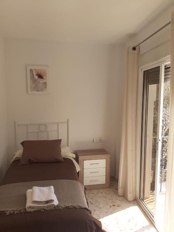 Apartamentos ปินอส เกนิล ภายนอก รูปภาพ